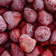 Frozen strawberries close up background with ice crystals and natural texture Frozen strawberries close up background with ice crystals and natural texture - PhotoDune Item for Sale