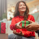 Close-up of people exchanging a holiday gift, symbolizing joy, generosity, and celebration during Ch Close-up of people exchanging a holiday gift, symbolizing joy, generosity, and celebration during Ch - PhotoDune Item for Sale