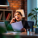 Senior Indian female executive using smartphone and laptop while reading papers in cozy office Senior Indian female executive using smartphone and laptop while reading papers in cozy office - PhotoDune Item for Sale