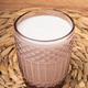 Enjoying traditional Saudi Arabian drink served in a glass on a woven mat Enjoying traditional Saudi Arabian drink served in a glass on a woven mat - PhotoDune Item for Sale