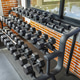 Heavy Metal Rack Holding Numerous Hexagonal Dumbbells Sits On Rubber Floor Heavy Metal Rack Holding Numerous Hexagonal Dumbbells Sits On Rubber Floor - PhotoDune Item for Sale