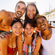 Happy friends laughing and enjoying summer vacation on the beach Happy friends laughing and enjoying summer vacation on the beach - PhotoDune Item for Sale