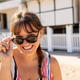 Cheerful portrait of happy young plus size woman in the beach smiling at camera Cheerful portrait of happy young plus size woman in the beach smiling at camera - PhotoDune Item for Sale