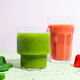 Two glasses of healthy green smoothie featuring avocado, spinach, and chia seeds and strawberry drin Two glasses of healthy green smoothie featuring avocado, spinach, and chia seeds and strawberry drin - PhotoDune Item for Sale