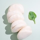 Plain white steamed bao buns isolated on a clean light background with shadows. Plain white steamed bao buns isolated on a clean light background with shadows. - PhotoDune Item for Sale