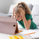 Stressed schoolgirl looking at a tablet while studying at home Stressed schoolgirl looking at a tablet while studying at home - PhotoDune Item for Sale