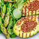 Healthy grilled avocado and asparagus salad with linen seeds. Gray slate background. Top view Healthy grilled avocado and asparagus salad with linen seeds. Gray slate background. Top view - PhotoDune Item for Sale