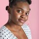 confident Young black woman posing in studio with bantu knots confident Young black woman posing in studio with bantu knots - PhotoDune Item for Sale