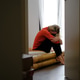 Woman suffering from depression sitting alone in her bedroom Woman suffering from depression sitting alone in her bedroom - PhotoDune Item for Sale