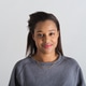 neutral Young adult woman smiling in studio portrait, looking confident neutral Young adult woman smiling in studio portrait, looking confident - PhotoDune Item for Sale