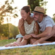 Loving couple in park Loving couple in park - PhotoDune Item for Sale