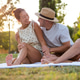 Loving couple in park Loving couple in park - PhotoDune Item for Sale