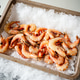 Fresh Prawns and Shrimp Displayed on Crushed Ice at Seafood Market Fresh Prawns and Shrimp Displayed on Crushed Ice at Seafood Market - PhotoDune Item for Sale