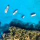 Aerial view of yachts and boats anchored in turquoise sea bay Aerial view of yachts and boats anchored in turquoise sea bay - PhotoDune Item for Sale