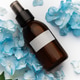 Cosmetic spray bottle with blue hydrangea petals Cosmetic spray bottle with blue hydrangea petals - PhotoDune Item for Sale