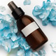 Cosmetic spray bottle with blue hydrangea petals Cosmetic spray bottle with blue hydrangea petals - PhotoDune Item for Sale
