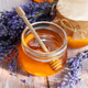 Lavender honey jars on rustic wooden background Lavender honey jars on rustic wooden background - PhotoDune Item for Sale