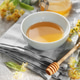 Natural linden blossom honey in bowl and jar Natural linden blossom honey in bowl and jar - PhotoDune Item for Sale