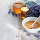 Lavender honey in bowl with dipper and fresh flowers Lavender honey in bowl with dipper and fresh flowers - PhotoDune Item for Sale