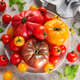 Fresh organic heirloom tomatoes from garden harvest Fresh organic heirloom tomatoes from garden harvest - PhotoDune Item for Sale