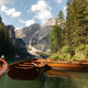 Traditional Wooden Boats on Lago di Braies in Mountain Landscape of Alps Traditional Wooden Boats on Lago di Braies in Mountain Landscape of Alps - PhotoDune Item for Sale