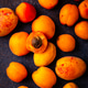 Fresh ripe apricots on dark background. Fresh ripe apricots on dark background. - PhotoDune Item for Sale