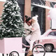Romantic couple kissing, hugging, having fun in winter, sitting on old pink bicycle during snowfall Romantic couple kissing, hugging, having fun in winter, sitting on old pink bicycle during snowfall - PhotoDune Item for Sale
