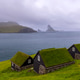 Bøur Village Turf Roof Homes with Sea Stacks in Distance Bøur Village Turf Roof Homes with Sea Stacks in Distance - PhotoDune Item for Sale