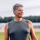 Middle-aged man enjoying fitness workout outdoors in nature Middle-aged man enjoying fitness workout outdoors in nature - PhotoDune Item for Sale
