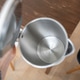 Inside view of electric kettle with clean shiny stainless steel interior Inside view of electric kettle with clean shiny stainless steel interior - PhotoDune Item for Sale