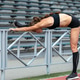 Female athlete stretching exercise Female athlete stretching exercise - PhotoDune Item for Sale