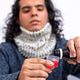 Young person pouring cough syrup taking medication Young person pouring cough syrup taking medication - PhotoDune Item for Sale