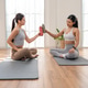 Young asian women toast water bottles after workout Young asian women toast water bottles after workout - PhotoDune Item for Sale