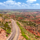 Highway through the famous Texas Palo Duro Canyon state park Highway through the famous Texas Palo Duro Canyon state park - PhotoDune Item for Sale