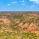 Highway through the famous Texas Palo Duro Canyon state park Highway through the famous Texas Palo Duro Canyon state park - PhotoDune Item for Sale