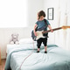 Little boy dreaming of being a rockstar Little boy dreaming of being a rockstar - PhotoDune Item for Sale