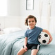 Happy little boy going to a soccer match Happy little boy going to a soccer match - PhotoDune Item for Sale