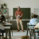 Diverse Teen Students Studying in Classroom with Male Teacher Diverse Teen Students Studying in Classroom with Male Teacher - PhotoDune Item for Sale