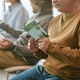 Young Adult Man Reviewing Supplement Brochure during Business Training Young Adult Man Reviewing Supplement Brochure during Business Training - PhotoDune Item for Sale