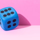 blue dice showing number six on pink background. Copy space blue dice showing number six on pink background. Copy space - PhotoDune Item for Sale