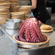 Close up of Cooked Octopus and Traditional Galician Wooden Plates at a Food Stall Counter Close up of Cooked Octopus and Traditional Galician Wooden Plates at a Food Stall Counter - PhotoDune Item for Sale