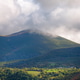 Above the meadows and villages surrounded by forests rises the imposing mass of Mount Penalonga Above the meadows and villages surrounded by forests rises the imposing mass of Mount Penalonga - PhotoDune Item for Sale