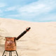 Brewing aromatic traditional coffee in a copper cezve on a sandy beach during siesta. Copy space for Brewing aromatic traditional coffee in a copper cezve on a sandy beach during siesta. Copy space for - PhotoDune Item for Sale