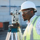 African american surveyor using total station at construction site African american surveyor using total station at construction site - PhotoDune Item for Sale