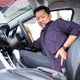 Young Asian male Driver Grimacing in Pain While Holding His Lower Back Inside Car Young Asian male Driver Grimacing in Pain While Holding His Lower Back Inside Car - PhotoDune Item for Sale
