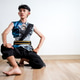 Young Indonesian Male Dancer Posing in Traditional Elegant Blue batik Costume on Light Background Young Indonesian Male Dancer Posing in Traditional Elegant Blue batik Costume on Light Background - PhotoDune Item for Sale