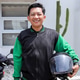 Portrait of Smiling Young Indonesian Online Motorcycle taxi Driver Standing Outdoors Portrait of Smiling Young Indonesian Online Motorcycle taxi Driver Standing Outdoors - PhotoDune Item for Sale