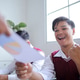 Thrilled Male Asian Student Raising His Fist in Celebration While Receiving Test Sheet with Charts Thrilled Male Asian Student Raising His Fist in Celebration While Receiving Test Sheet with Charts - PhotoDune Item for Sale