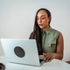 Young black woman participating in online group therapy session Young black woman participating in online group therapy session - PhotoDune Item for Sale
