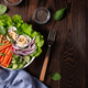 Balanced salad with green lettuce, cucumber, boiled eggs and chickpeas for lunch on wooden table. To Balanced salad with green lettuce, cucumber, boiled eggs and chickpeas for lunch on wooden table. To - PhotoDune Item for Sale